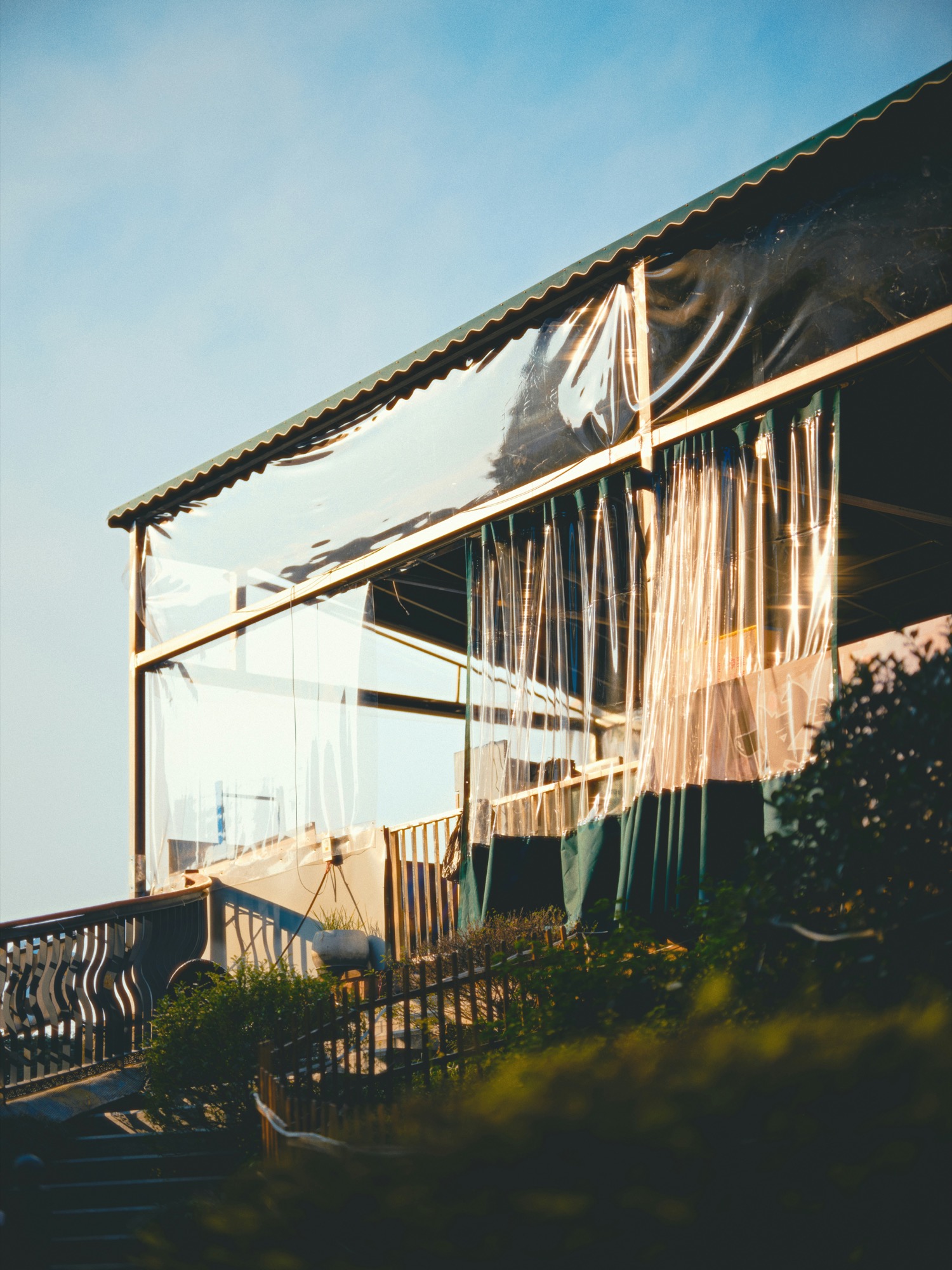 Clear outdoor curtains used for rain and wind protection